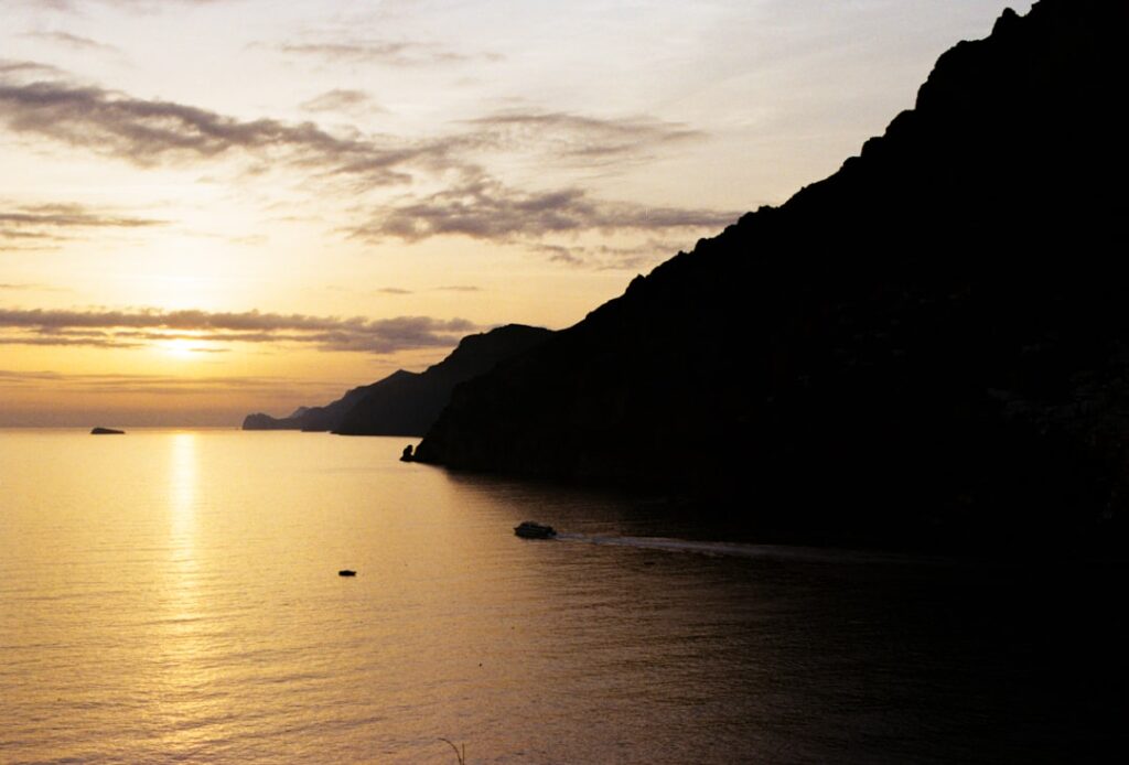 Couple Amalfi Coast sunset embrace