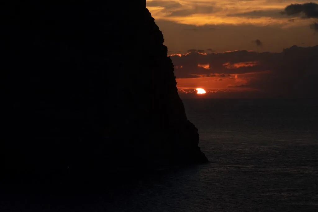Ischia sunset cliff silhouette
