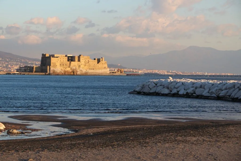 Castel dell'Ovo at sunset on the seaside