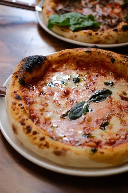 Classic Neapolitan margherita with blistered crust and fresh basil
