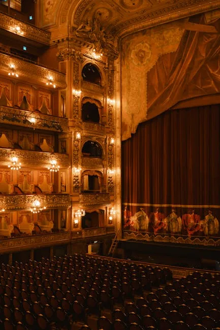 Interior of Naples' historic Teatro San Carlo with golden boxes and stage.