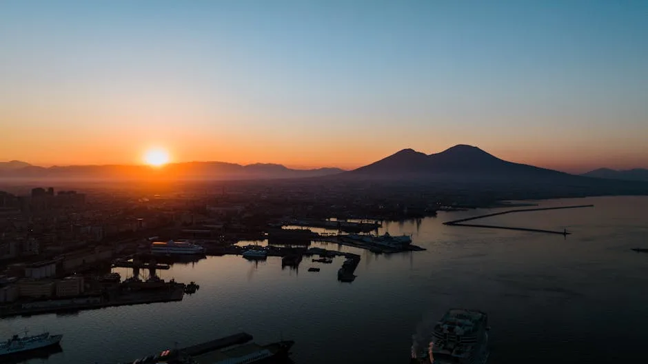 Naples bay sunset with Vesuvius silhouette