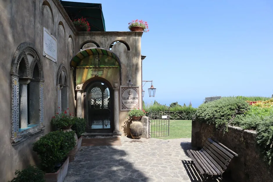 Entrance arch and courtyard of Villa Cimbrone hotel in Ravello